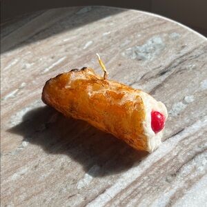 Realistic Fake Cannoli with Cherry